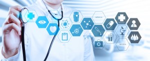 Doctor with a stethoscope in the hands and office background